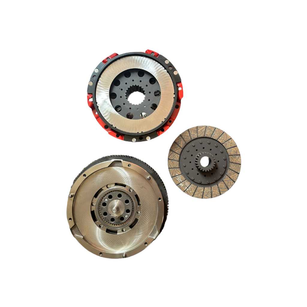 A set of three automotive clutch components, including a flywheel, a pressure plate, and a clutch disc, displayed on a solid white background.